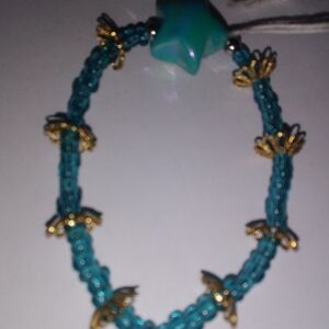 Handcrafted Turquoise Beaded Bracelet with Gold Accents